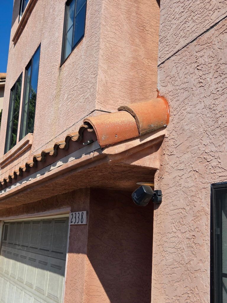 completed tile roof repair in la jolla with repaired section blending into existing roof